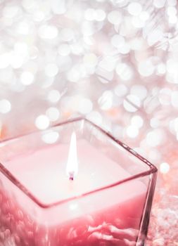 Festive decoration, branding and aromatherapy spa concept - Rose aromatic candle on Christmas and New Years glitter background, Valentines Day luxury home decor and holiday season brand design