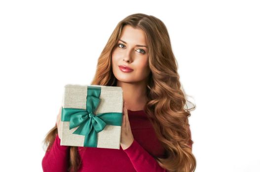 Christmas holiday present, happy woman holding a gift or luxury beauty box subscription delivery isolated on white background, portrait