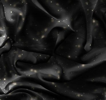Winter fashion, shiny fabric and night party style concept - Magic holiday black silk flatlay background texture with golden shine, luxury glamour abstract backdrop