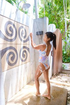 Asian women in the shower, women in an outdoor shower.