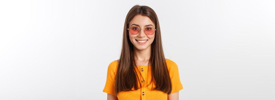 Fashion girl hipster in glasses. White background isolated