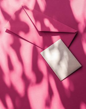 Holiday marketing, business kit and email newsletter concept - Beauty brand identity as flatlay mockup design, business card and letter for online luxury branding on pink shadow background