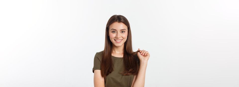 Close-up portrait of yong woman casual portrait in positive view, big smile, beautiful model posing in studio over white background