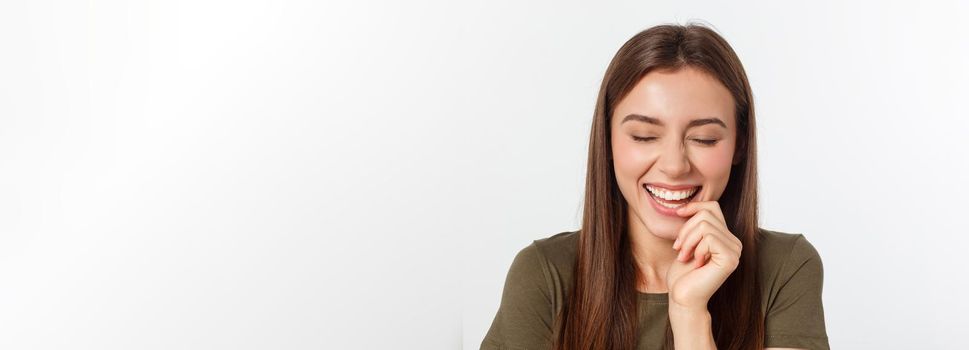 Portrait joyful outgoing woman likes laugh out loud not hiding emotions giggling chuckling facepalm close eyes smiling broadly white background.