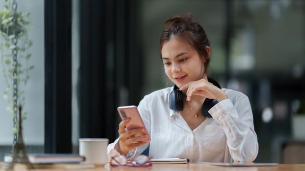 A business woman using fingerprint scan to cyber security for his saving account, business, technology and future Concept.