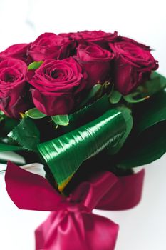 Gift for her, romantic relationship and floral design concept - Luxury bouquet of burgundy roses on marble background, beautiful flowers as holiday love present on Valentines Day