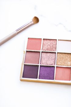 Cosmetic branding, fashion blog and glamour set concept - Eye shadow palette swatches on marble background, make-up and eyeshadows cosmetics product for luxury beauty brand and holiday flatlay design