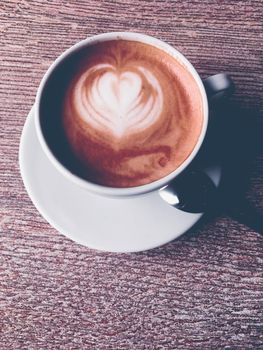 Brunch in Paris, drinks menu and vintage recipe concept - Cappuccino for breakfast in cafeteria, coffee cup on table in parisian cafe