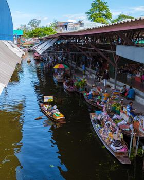 People at Damnoen saduak floating market, Bangkok Thailand. colorful floating market in Thailand