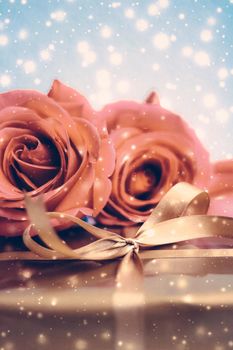 Vintage design, shop sale promotion and happy surprise concept - Luxury holiday golden gift box and bouquet of roses as Christmas, Valentines Day or birthday present