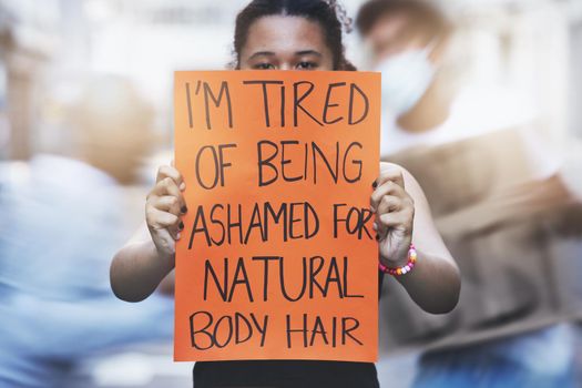 Poster, woman protest and body hair positive freedom with cardboard sign for change in feminism or equality. Protesting, female activist and banner to voice or support no shame no shame movement.
