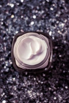 Cosmetic branding, sunscreen spf and facial care concept - Luxury face cream for healthy skin on shiny glitter sunlight background, moisturizing cosmetics and natural skincare beauty brand product