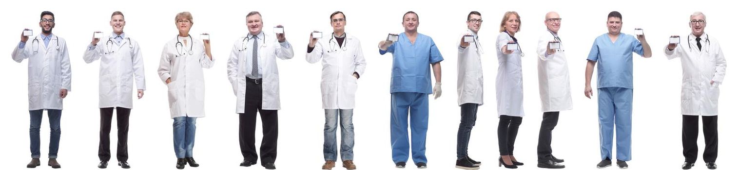 full length group of doctors showing badge isolated on white background