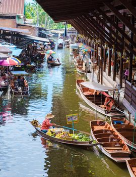 People at Damnoen saduak floating market, Bangkok Thailand. colorful floating market in Thailand