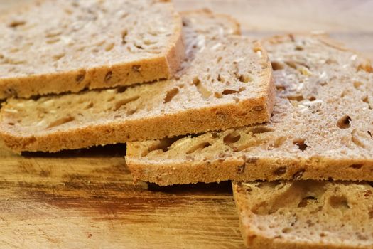 Selective focus view at slices of fresh baked crusty bread