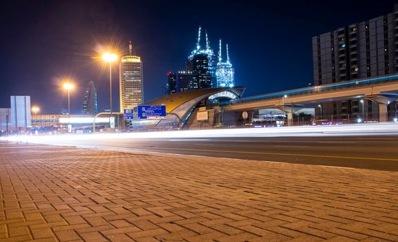 Main road of a United Arab Emirates, Shekh Zayed road. Shot taken in Dubai. Many of famous landmarks such World trade center, Etisalat telecom company head quarters, Zabeel one building under construction can be seen as well as metro station. Outdoors