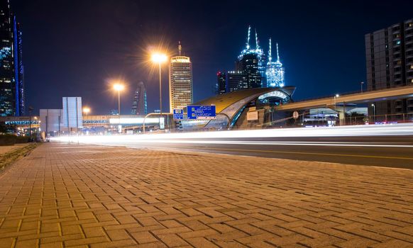 Main road of a United Arab Emirates, Shekh Zayed road. Shot taken in Dubai. Many of famous landmarks such World trade center, Etisalat telecom company head quarters, Zabeel one building under construction can be seen as well as metro station. Outdoors