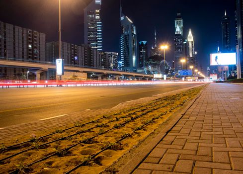 Main road of a United Arab Emirates, Shekh Zayed road. Shot taken in Dubai. Many of famous landmarks can be seen as well as metro station and Museum of future. Outdoors