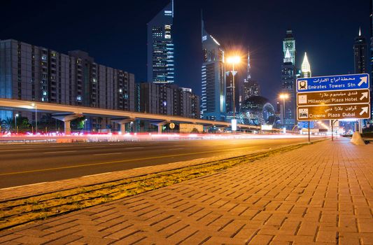 Main road of a United Arab Emirates, Shekh Zayed road. Shot taken in Dubai. Many of famous landmarks can be seen as well as metro station and Museum of future. Outdoors
