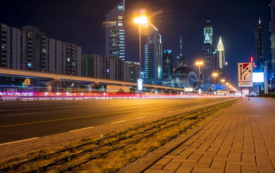 Main road of a United Arab Emirates, Shekh Zayed road. Shot taken in Dubai. Many of famous landmarks can be seen as well as metro station and Museum of future. Outdoors