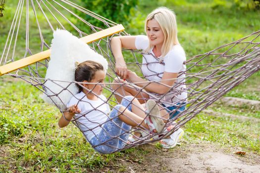 Portrait of family in a hammock