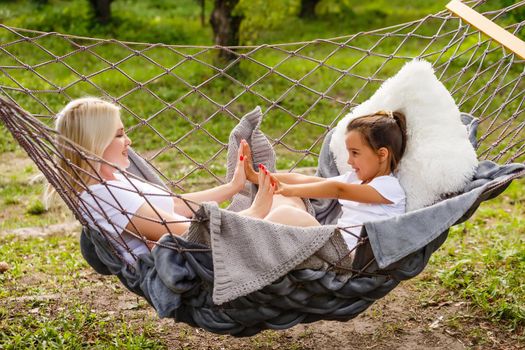 Portrait of family in a hammock