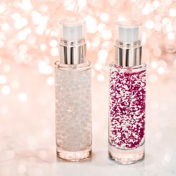 Cosmetic branding, blank label and glamour present concept - Holiday make-up base gel, serum emulsion, lotion bottle and rose gold glitter, luxury skin and body care cosmetics for beauty brand ads