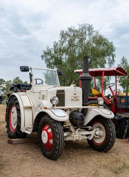 Hodonin - Panov, Czech Republic - July 20, 2022 Exhibition of historic tractors Tractor Lanz Buldog type 1937 in white color