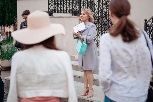 image of an organized group of tourists during an excursion .