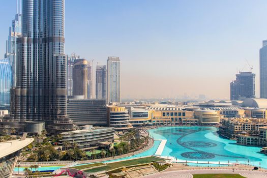 Dubai, UAE - 02.04.2021 Shot of largest shopping mall in the world - Dubai Mall. Also in the picture Burj Khalifa lake and Souq Al Bahar residencies