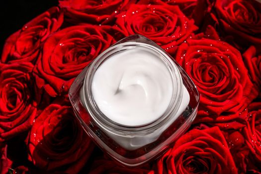 Anti-age moisturizer, luxe cosmetics and organic science concept - Moisturizing beauty face cream for sensitive skin and red roses flowers, luxury clean skincare cosmetics on floral background