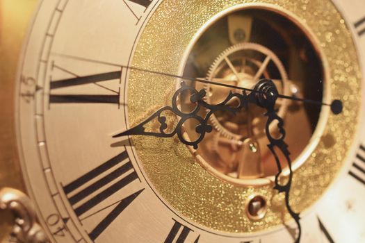 A gold vintage clock hands
