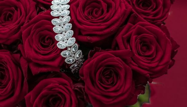 Luxe branding, glamour fashion and boutique shopping concept - Luxury diamond jewelry bracelet and red roses flowers, love gift on Valentines Day and jewellery brand holiday background design