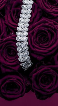 Luxe branding, glamour fashion and boutique shopping concept - Luxury diamond jewelry bracelet and purple roses flowers, love gift on Valentines Day and jewellery brand holiday background design