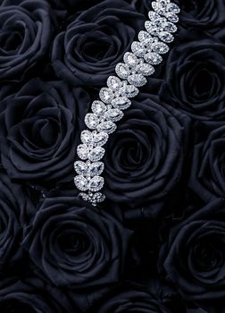 Luxe branding, glamour fashion and boutique shopping concept - Luxury diamond jewelry bracelet and black roses flowers, love gift on Valentines Day and jewellery brand holiday background design