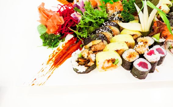 Food, travel and healthy eating concept - Japanese sushi in a restaurant at lunch time, asian cuisine