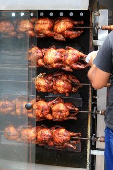 salvador, bahia, brazil - september 17, 2022: Roast chicken at a street restaurant in Salvador city.