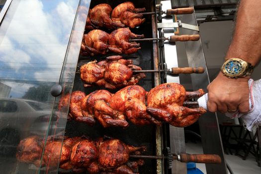 salvador, bahia, brazil - september 17, 2022: Roast chicken at a street restaurant in Salvador city.