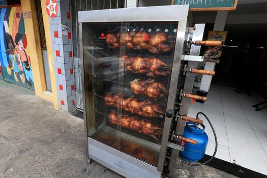 salvador, bahia, brazil - september 17, 2022: Roast chicken at a street restaurant in Salvador city.