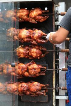 salvador, bahia, brazil - september 17, 2022: Roast chicken at a street restaurant in Salvador city.