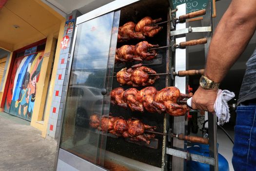 salvador, bahia, brazil - september 17, 2022: Roast chicken at a street restaurant in Salvador city.