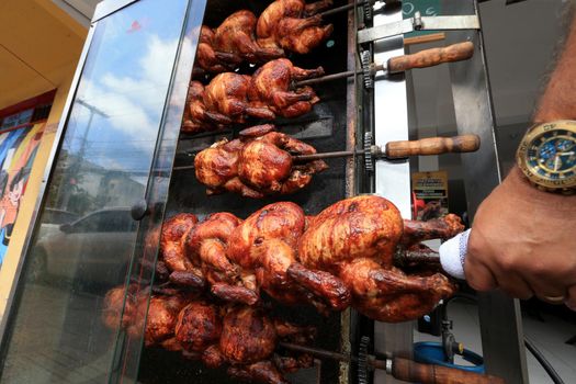 salvador, bahia, brazil - september 17, 2022: Roast chicken at a street restaurant in Salvador city.