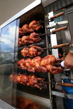 salvador, bahia, brazil - september 17, 2022: Roast chicken at a street restaurant in Salvador city.