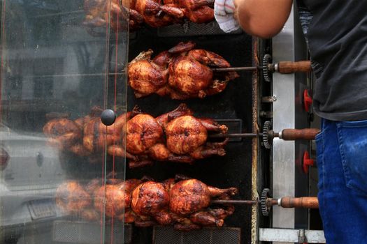 salvador, bahia, brazil - september 17, 2022: Roast chicken at a street restaurant in Salvador city.