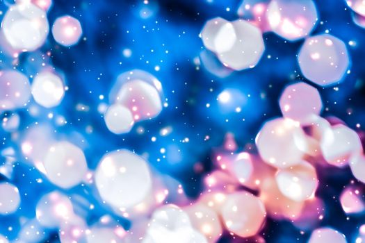 Christmas lights, New Years Eve fireworks and abstract texture concept - Magic sparkling shiny glitter and glowing snow, luxury winter holiday background