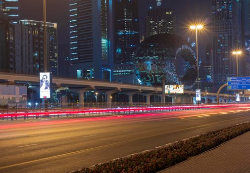 Dubai,UAE - 05.18.2021 Main road of a United Arab Emirates, Shekh Zayed road.Many of famous buildings can be seen as well as metro station and Museum of future.
