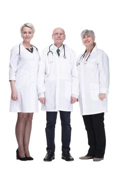 in full growth. experienced doctors colleagues standing together. isolated on a white background.