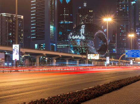 Dubai,UAE - 05.18.2021 Main road of a United Arab Emirates, Shekh Zayed road.Many of famous buildings can be seen as well as metro station and Museum of future