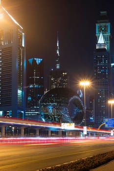 Dubai,UAE - 05.18.2021 Main road of a United Arab Emirates, Shekh Zayed road.Many of famous buildings can be seen as well as metro station and Museum of future.