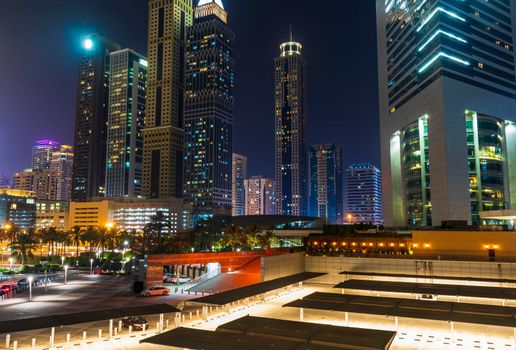 Dubai, UAE - 05.28.2021 Shot of a Dubai International Financial center and Sheikh Zayed road at night.